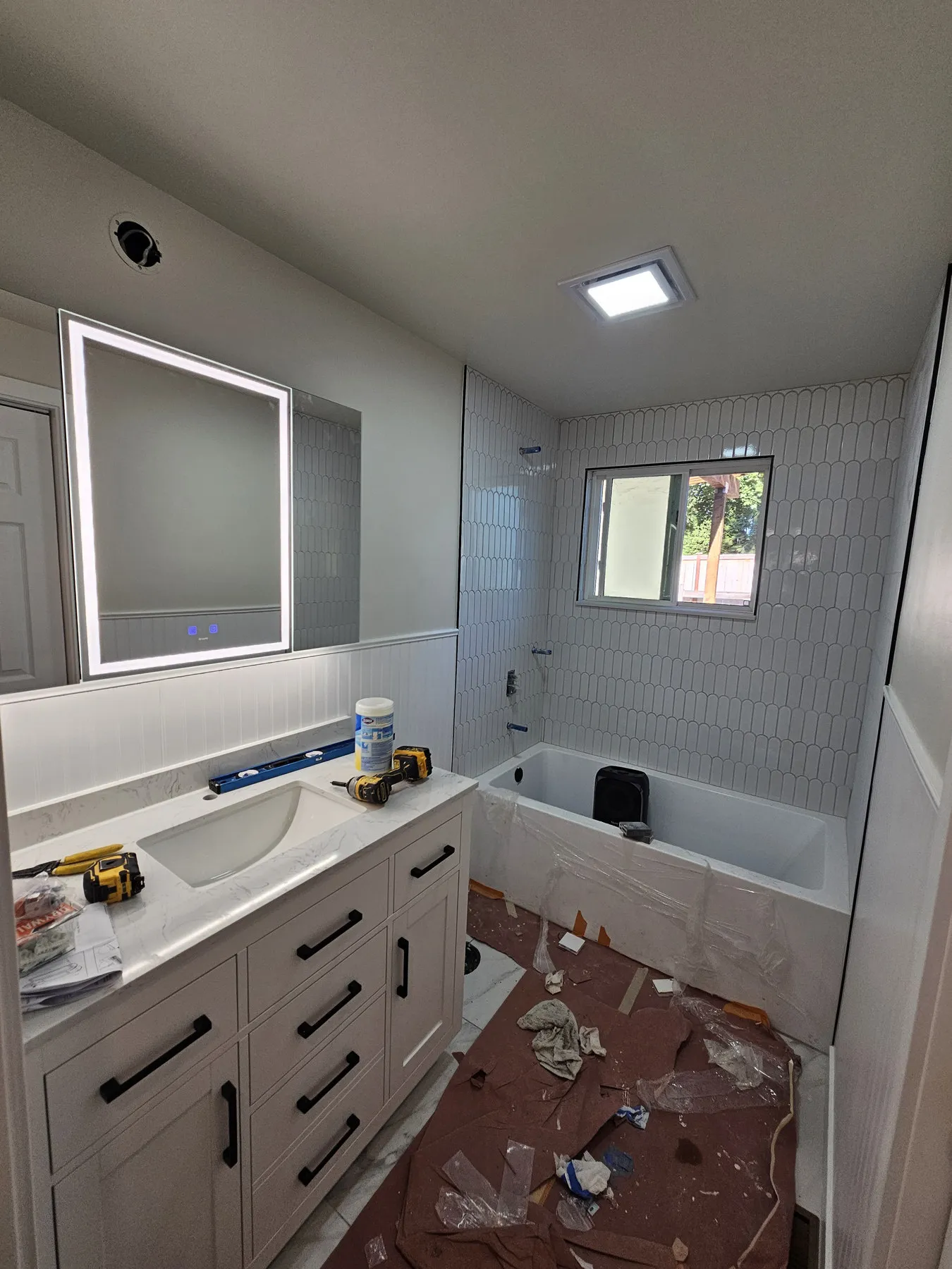 Before — stripped back to subfloor then tiled and refitted — Hilltop, Bellevue
